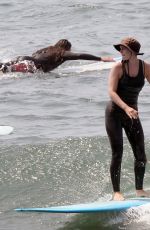 LEIGHTON MEESTER Out Surfing in Malibu 07/21/2021