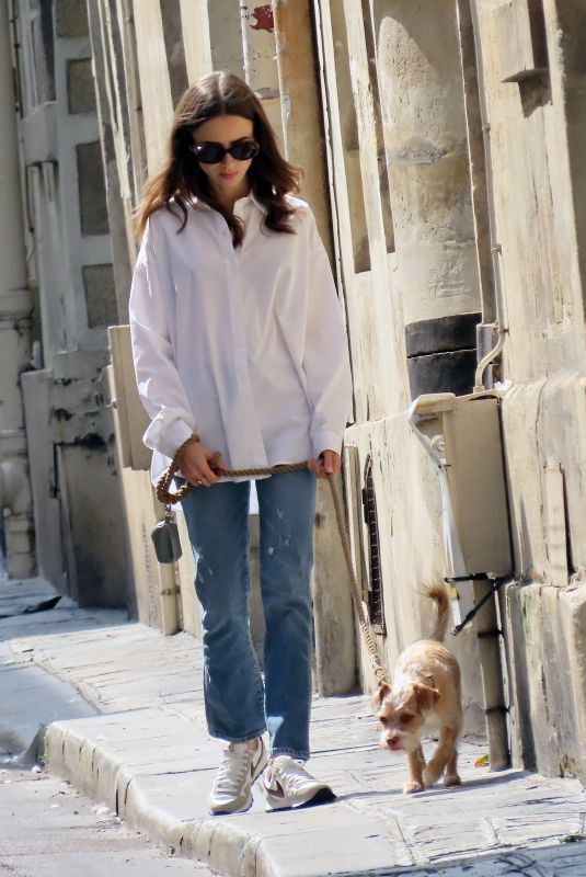 LILY COLLINS Out with Her Dog in Paris 07/18/2021
