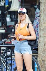 LOTTIE MOSS in Denim SHorts Shows a Diamond Ring on Her Engagement Finger Out in Notting Hill 07/14/2021