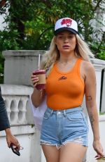LOTTIE MOSS in Denim SHorts Shows a Diamond Ring on Her Engagement Finger Out in Notting Hill 07/14/2021