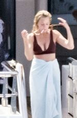 MELANIE GRIFFITH in Bikini at a Yacht in Nerano 07/29/2021