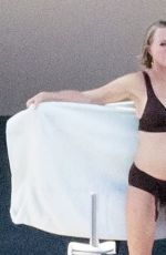 MELANIE GRIFFITH in Bikini at a Yacht in Nerano 07/29/2021