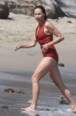 MINNIE DRIVER in Swimsuit at a Beach in Malibu 07/07/2021