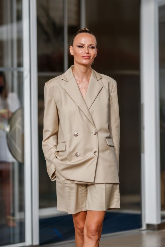 NATASHA POLY Leaves Hotel Martinez in Cannes 07/12/2021