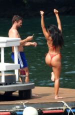 NICOLE SCHERZINGER in a Red Bikini Celebrates Her 43rd Birthday in Lake Como 06/28/2021