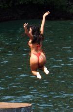 NICOLE SCHERZINGER in a Red Bikini Celebrates Her 43rd Birthday in Lake Como 06/28/2021