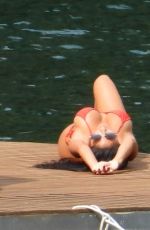 NICOLE SCHERZINGER in a Red Bikini Celebrates Her 43rd Birthday in Lake Como 06/28/2021