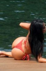 NICOLE SCHERZINGER in a Red Bikini Celebrates Her 43rd Birthday in Lake Como 06/28/2021
