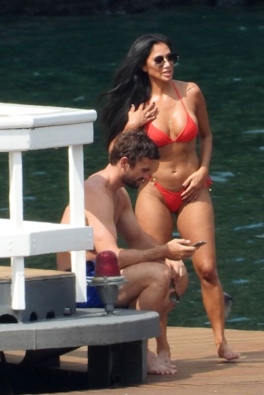 NICOLE SCHERZINGER in a Red Bikini Celebrates Her 43rd Birthday in Lake Como 06/28/2021