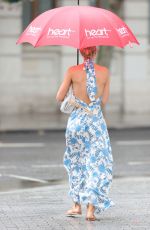 VOGUE WILLIAMS Braves the Rain Out in London 07/04/2021