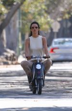 ALESSANDRA AMBROSIO Rides Her Son