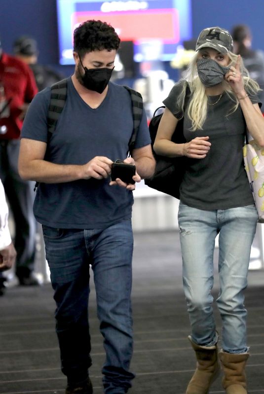 ANNA FARIS at LAX Airport in Los Angeles 08/22/2021