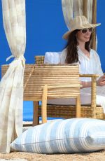 ANNE HATHAWAY on the Set of WeCrashed at Shores Atlantic Beach 08/16/2021