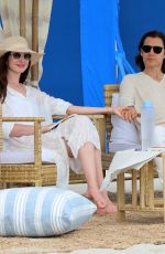 ANNE HATHAWAY on the Set of WeCrashed at Shores Atlantic Beach 08/16/2021
