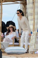 ANNE HATHAWAY on the Set of WeCrashed at Shores Atlantic Beach 08/16/2021