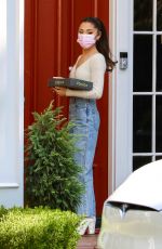 ARIANA GRANDE Out with a Box of Donuts in Los Angeles 08/13/2021