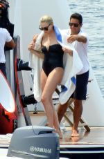CHARLIZE THERON in a Black Swimsuit at a Yacht in Greece 08/08/2021
