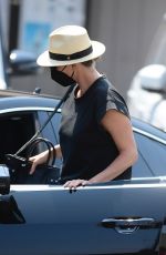CHARLIZE THERON in Denim Out for Lunch in Los Angeles 08/24/2021