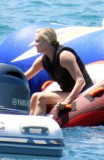 CHARLIZE THERON in Swimsuit at a Yacht at Poros Island 08/08/2021