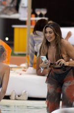 CHLOE FERRY in Bikini at a Beach Club in Ibiza 08/02/2021