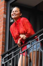 CHRISSY TEIGEN in Denim Shorts Out in New York 08/20/2021