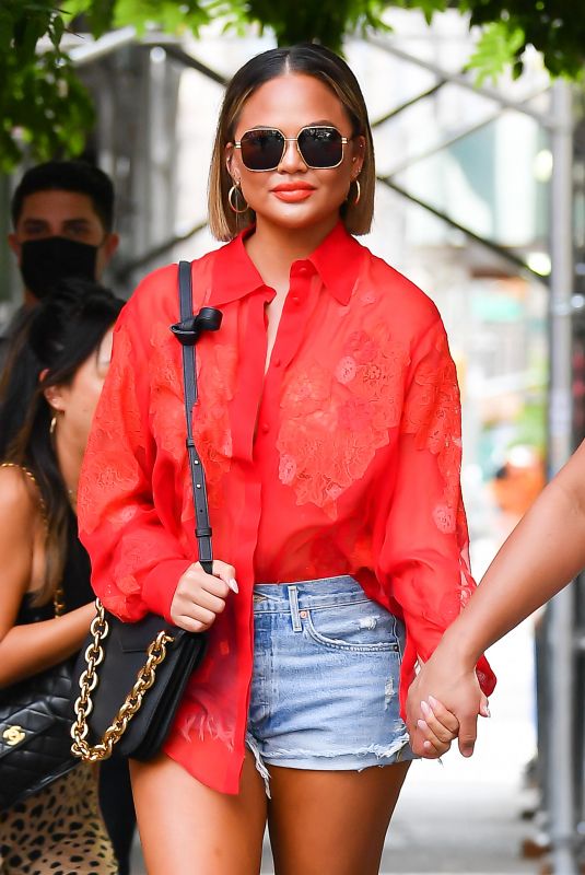 CHRISSY TEIGEN in Denim Shorts Out in New York 08/20/2021