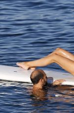 CHRISTINE QUINN in Bikini Practicing Yoga on a Board in Taormina 08/07/2021