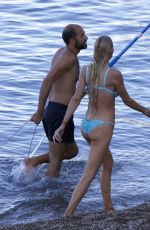 CHRISTINE QUINN in Bikini Practicing Yoga on a Board in Taormina 08/07/2021
