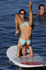 CHRISTINE QUINN in Bikini Practicing Yoga on a Board in Taormina 08/07/2021