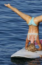 CHRISTINE QUINN in Bikini Practicing Yoga on a Board in Taormina 08/07/2021