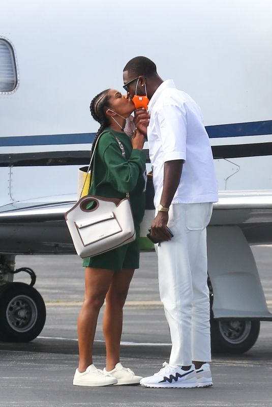 GABRIELLE UNION and Dwyane Wade Board a Private Jet in Martha
