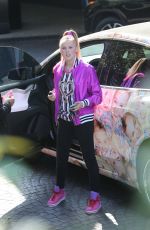 JOJO SIWA in Her Tesla Covered with Pictures of Her Face Out in Los Angeles 08/30/2021