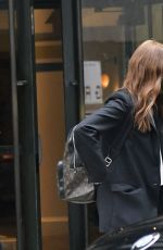 JULIANNE MOORE Leaves Her Hotel in New York 08/25/2021