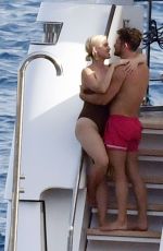 KATY PERRY in Swimsuit and Orlando Bloom Kissing at a Yacht in Capri 08/01/2021