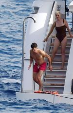 KATY PERRY in Swimsuit and Orlando Bloom Kissing at a Yacht in Capri 08/01/2021