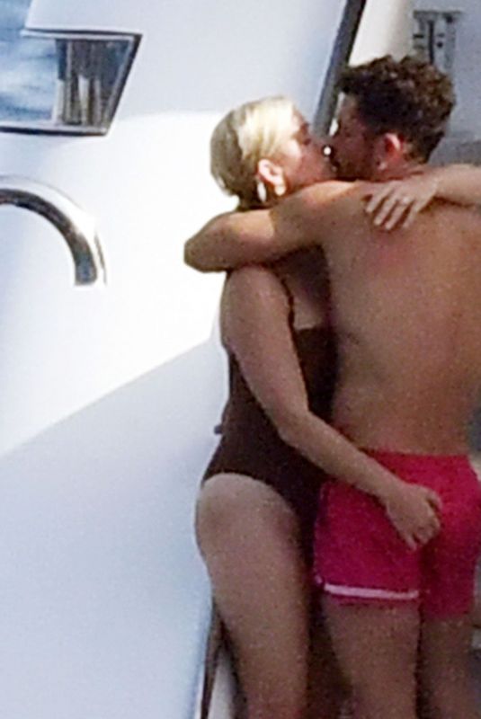 KATY PERRY in Swimsuit and Orlando Bloom Kissing at a Yacht in Capri 08/01/2021