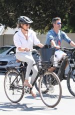 LAUREN SILVERMAN and Simon Cowell Riding Bikes Out in Malibu 08/26/2021