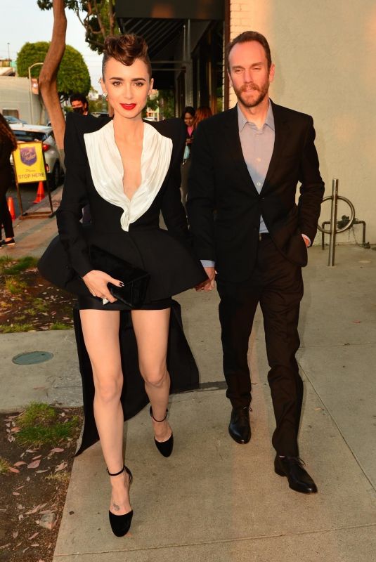 LILY COLLINS and Charlie McDowell at Cartier