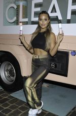 LOTTIE TIOMLINSON at Launch of Her Tanology on Market St in Manchester 08/08/2021