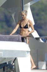 NATASHA POLY in Bikini at a Yacht in Sardinia 08/14/2021