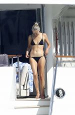 NATASHA POLY in Bikini at a Yacht in Sardinia 08/14/2021