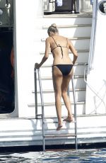 NATASHA POLY in Bikini at a Yacht in Sardinia 08/14/2021