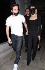 NICOLA PELTZ and Brooklyn Beckham at Craig