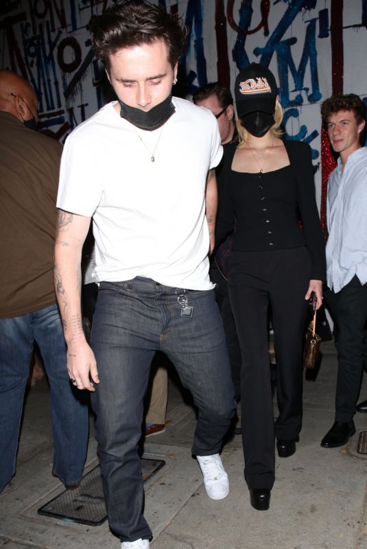 NICOLA PELTZ and Brooklyn Beckham at Craig