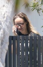 OLIVIA WILDE Taking at Order from Target Outside Her Home in Los Angeles 08/11/2021