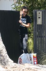 OLIVIA WILDE Taking at Order from Target Outside Her Home in Los Angeles 08/11/2021