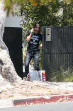 OLIVIA WILDE Taking at Order from Target Outside Her Home in Los Angeles 08/11/2021