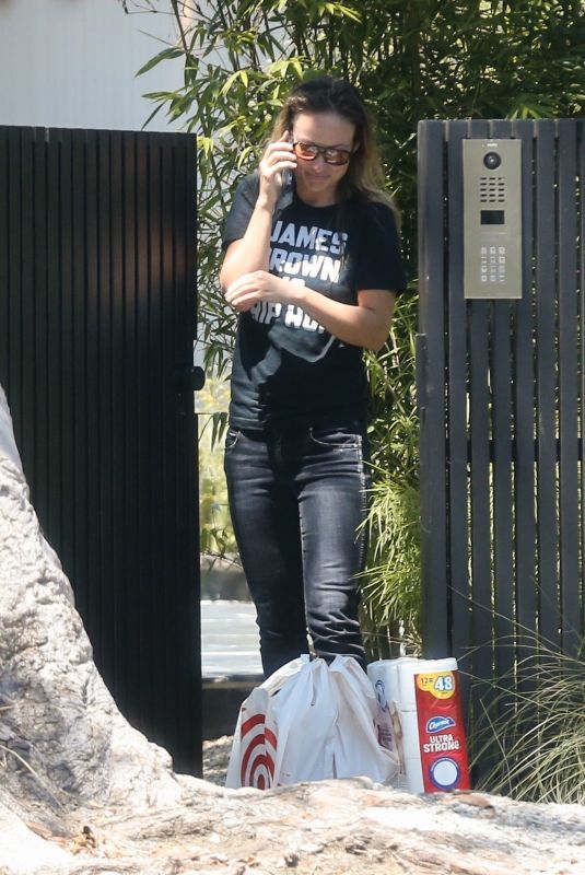 OLIVIA WILDE Taking at Order from Target Outside Her Home in Los Angeles 08/11/2021