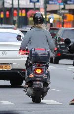 PAULINA PORIZKOVA Out Driving a Scooter in New York 08/12/2021