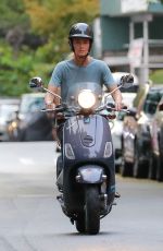PAULINA PORIZKOVA Out Driving a Scooter in New York 08/12/2021
